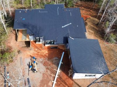 New shingle roof installation on a residential home by Santos Roofing in Western NC